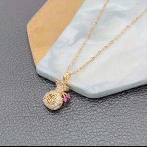Vintage Bag-Style Necklace with White Diamond Stones – Unique Golden Jewelry for Women | Kiswa Online Store